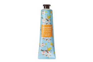 The Saem - Crème pour les mains parfumée - Fleur de pêche - 30ml The Saem - Crème pour les mains parfumée - Fleur de pêche - 30ml