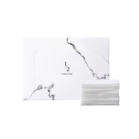 Chrisma - 1/2 Cotton Pad - 100pièces Chrisma - 1/2 Cotton Pad - 100pièces